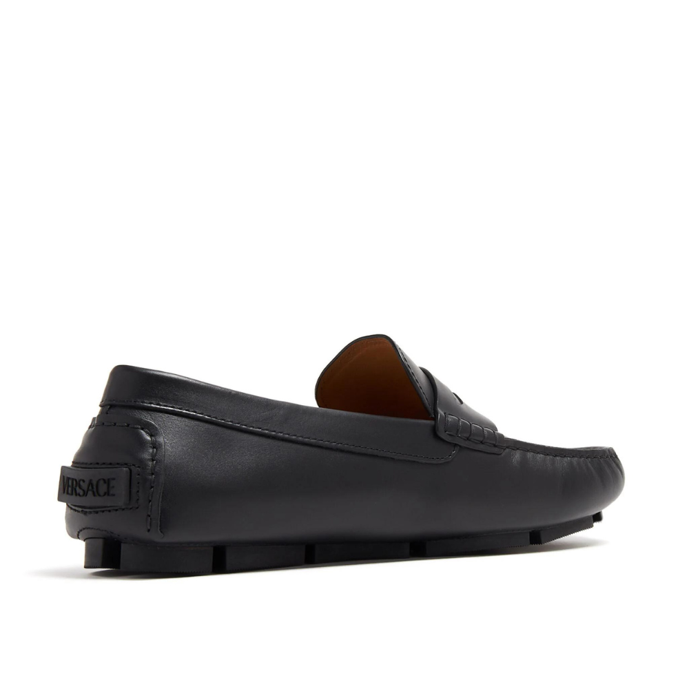 Medusa-plaque leather loafers