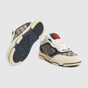 Beige and blue lifestyle sneakers with cushioned heel and textured sole