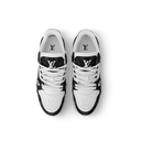 Top view of lace-up sneakers with patterned tongue and contrasting laces