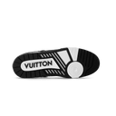 Outsole of sneaker with textured grip and bold script-style imprint